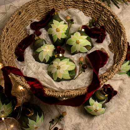 Poinsettia in Verte Round Shaped Ceramic Ornament
